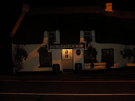 Irish pub at night - Public Domain Photograph